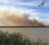 Humo en la ciudad, incendio en las islas 