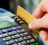Tarjetas: suprimen comisiones fijas para comercios y limitan capitalización de intereses